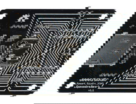 Sloty na kartę microSD i baterię CR1220 znajdują się na odwrocie płytki.