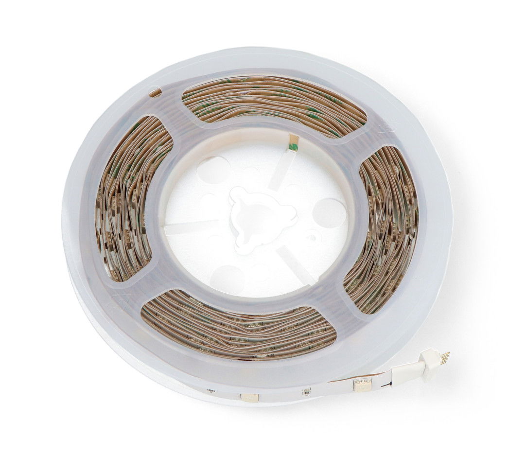 A white rolled LED strip lies on a white background.