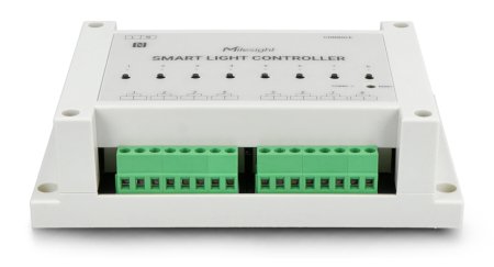 The creamy white lorawan lighting controller lies on a white background from a top perspective.