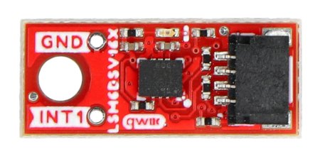 The red IMU sensor micromodule lies on a white background.