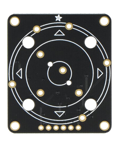 The black encoder module lies upside down on a white background.