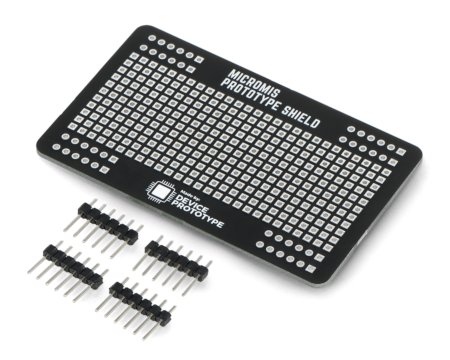 A black micromis breadboard lies on a white background along with the contents of the kit.
