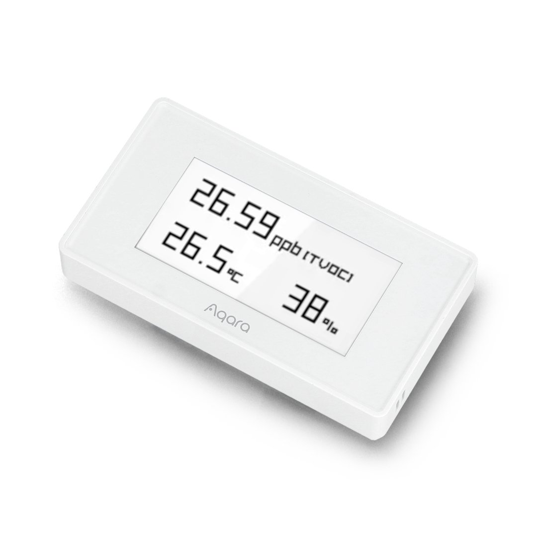 A white air quality sensor with display lies on a white background.