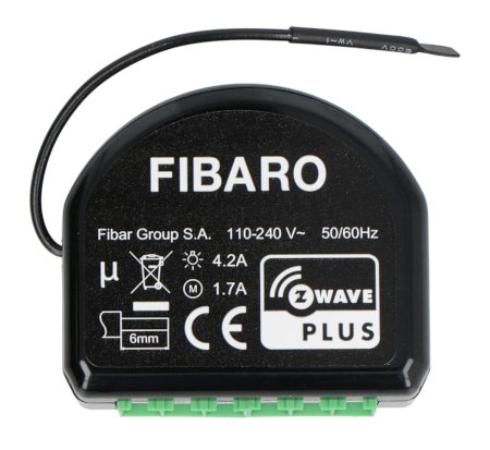 The Fibaro roller shutter controller in a black casing lies on a white background.
