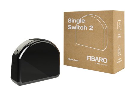 A black Fibaro relay lies on a white background with a box.